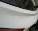吉利远景X3白色汽车二年多时车身的三个部位发生油漆严重脱落